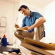 Man installing flooring